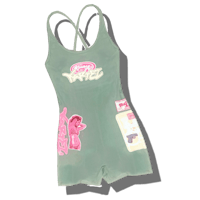 a green one piece swimsuit with pink and pink stickers on it