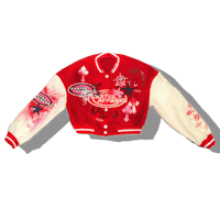 a red and white varsity jacket with stars on it
