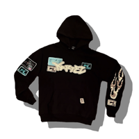 a black hoodie with graffiti on it